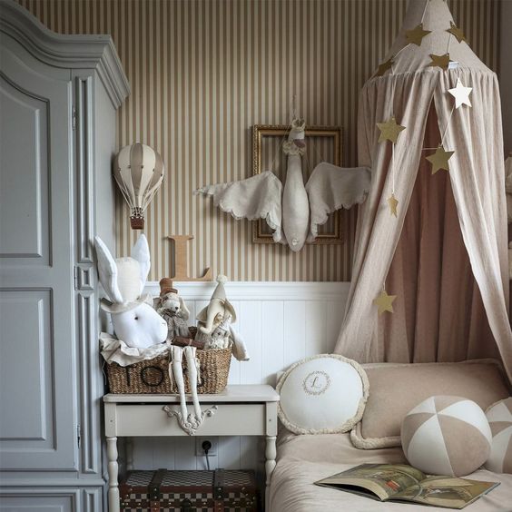 gold and beige decorative hot air balloon in classic baby nursery