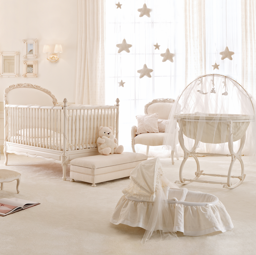 cream luxury baby cot in stylish nursery room