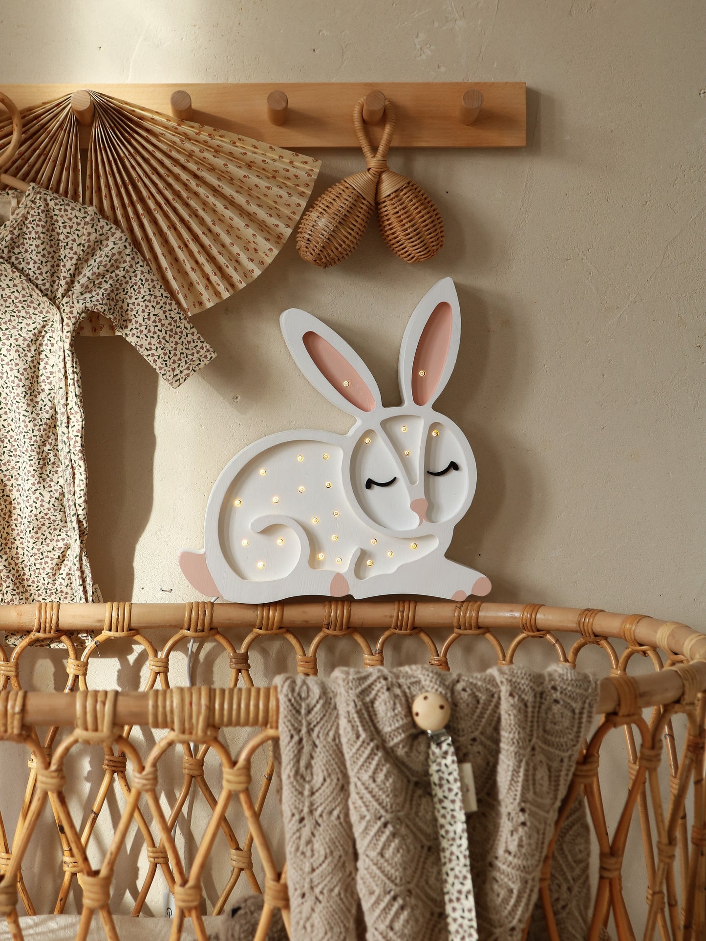 bunny-shaped lamp in baby nursery