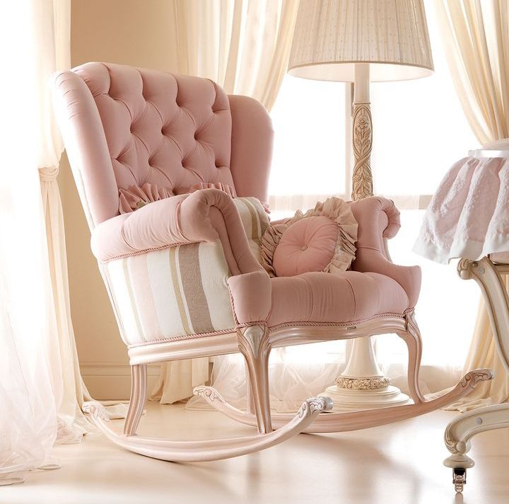 pink upholstered rocking chair