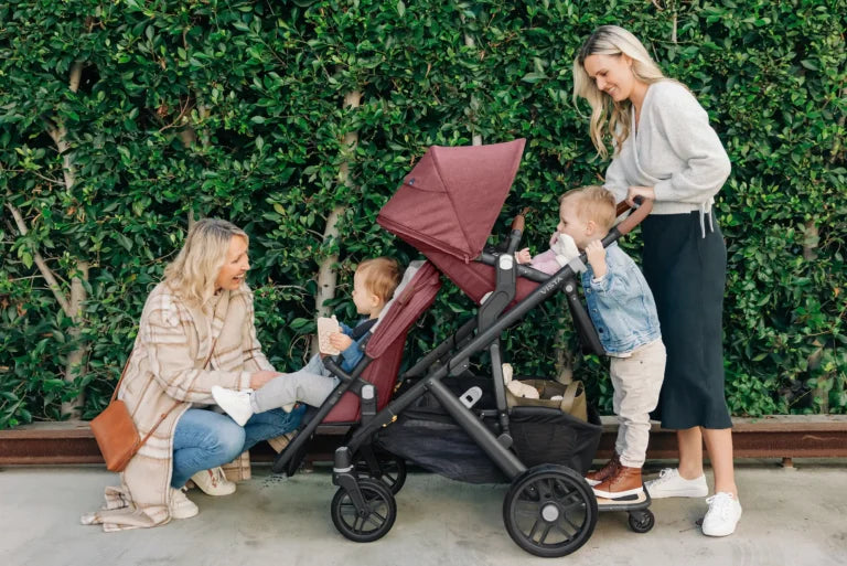 UPPAbaby vista v2 pushchair in use by family outdoors